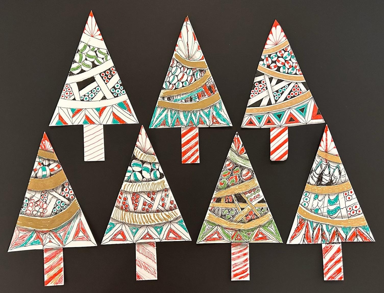 Zentangle Christmas trees collage with intricate black and white patterns
